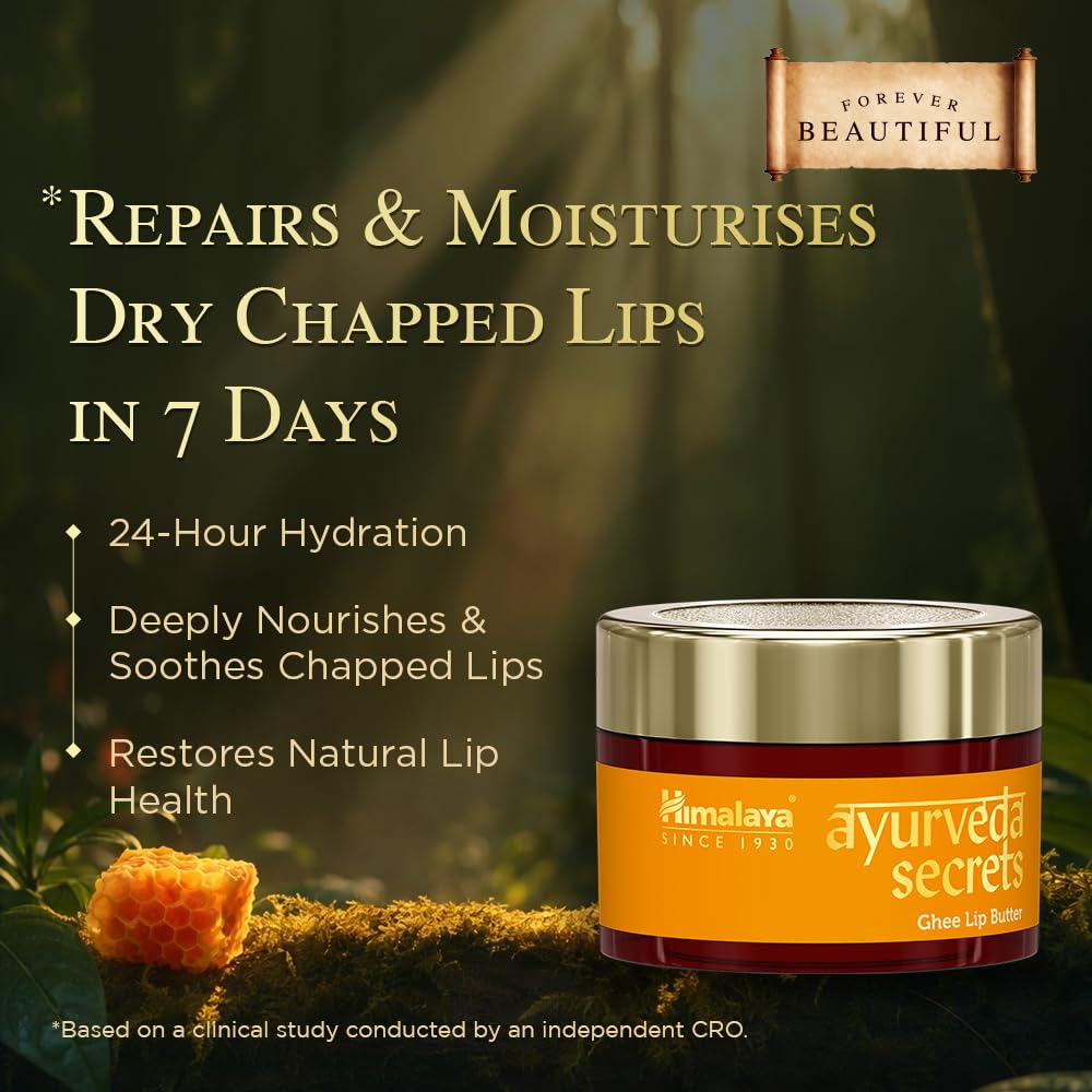Ayurveda Secrets lip balm jar with natural elements and product benefits text on a blurred green background.