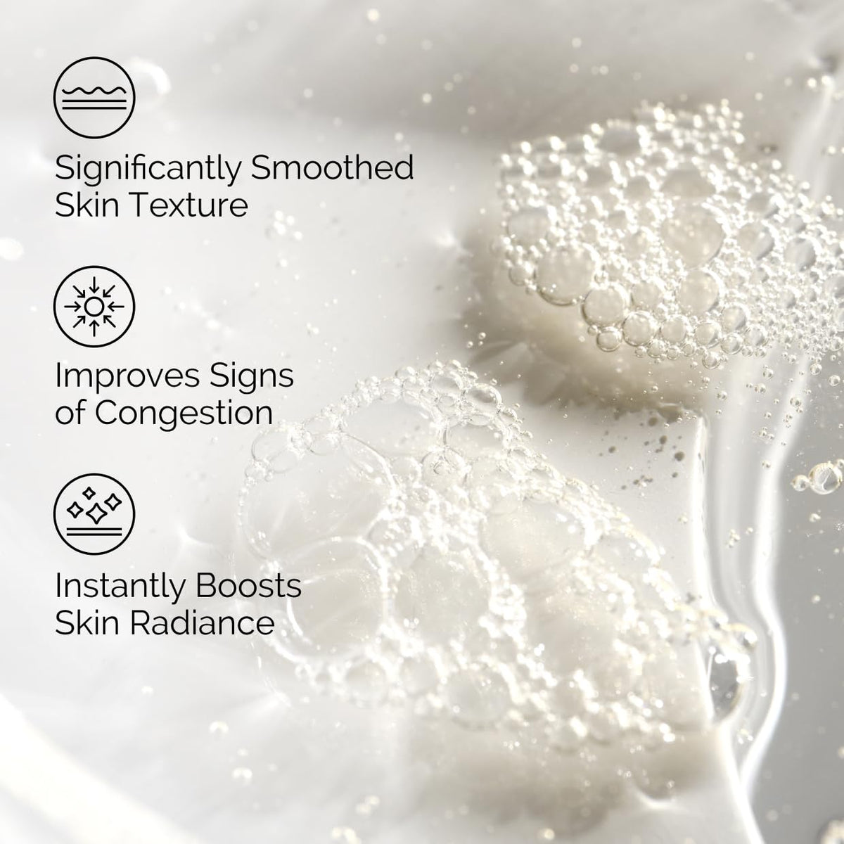 Close-up of skincare product with text highlighting benefits on a light background