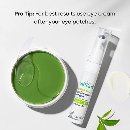 Green tea eye patches in a container with a bottle of eye cream on a white background.