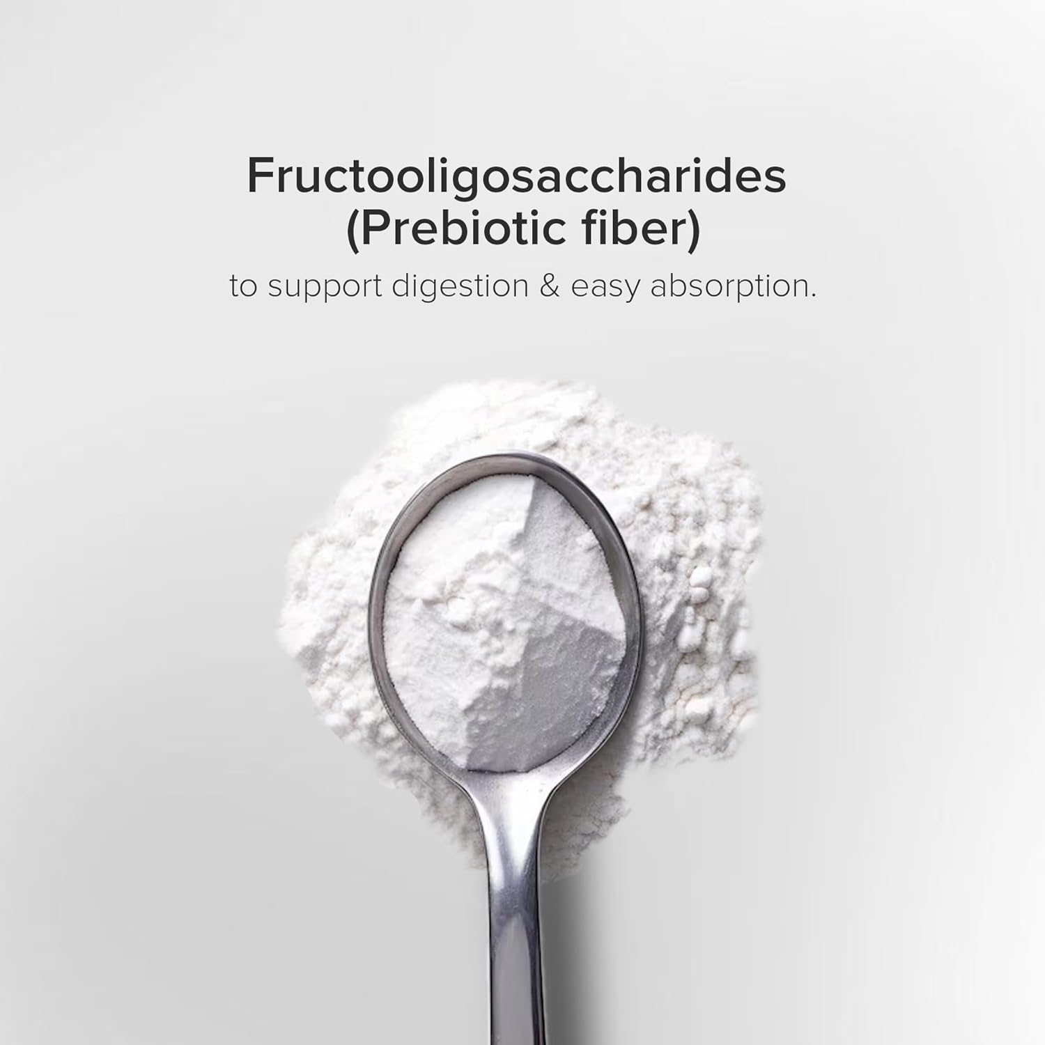 Spoonful of fructooligosaccharides powder with text on a light gray background