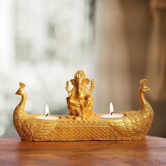 Gold Plated Ganesha Idol Statue Sitting On Peacock Boat with Tea Light Holders | Showpiece for Table, Living Room, Home Decoration