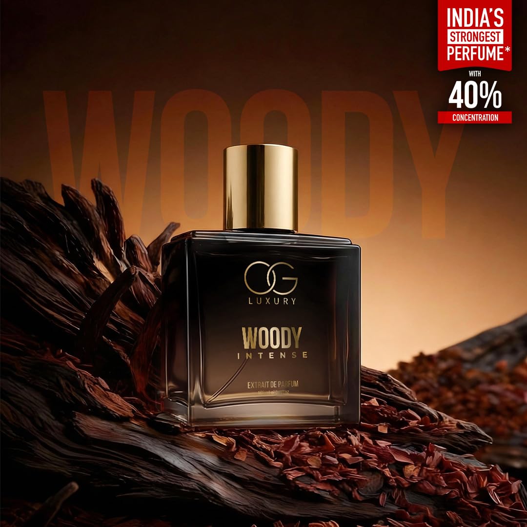 Perfume bottle labeled 'Woody Intense' by OG Luxury on a wooden background with text claiming it's 'India's Strongest Perfume'.