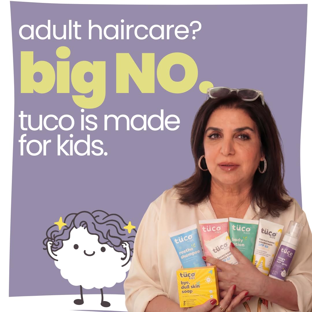 Advertisement for tuco hair care products with a woman holding the products against a purple background.