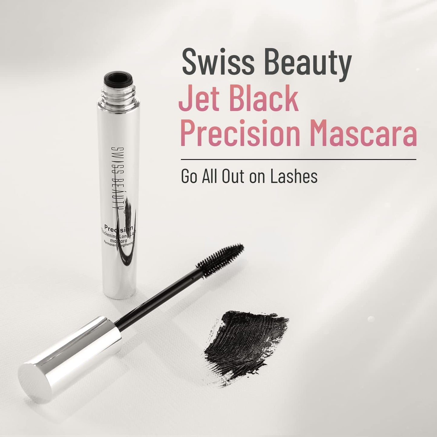 Swiss Beauty Jet Black Precision Mascara with wand and product smear on a white background