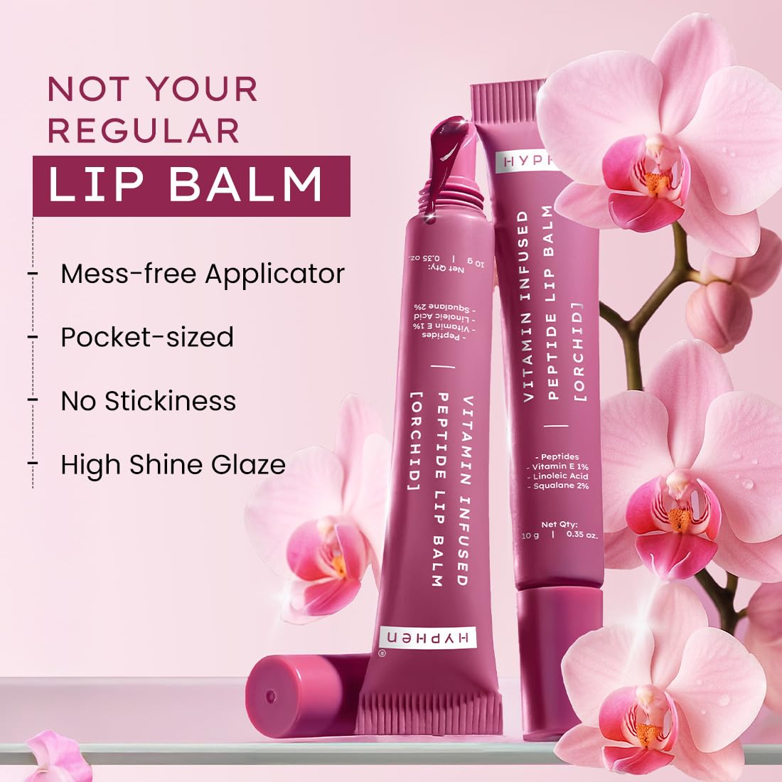 Lip balm with orchids on a pink background