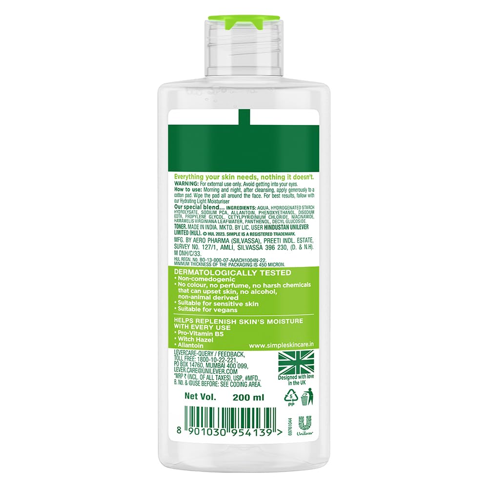 Bottle of Simple Kind To Skin body wash with green label on a white background