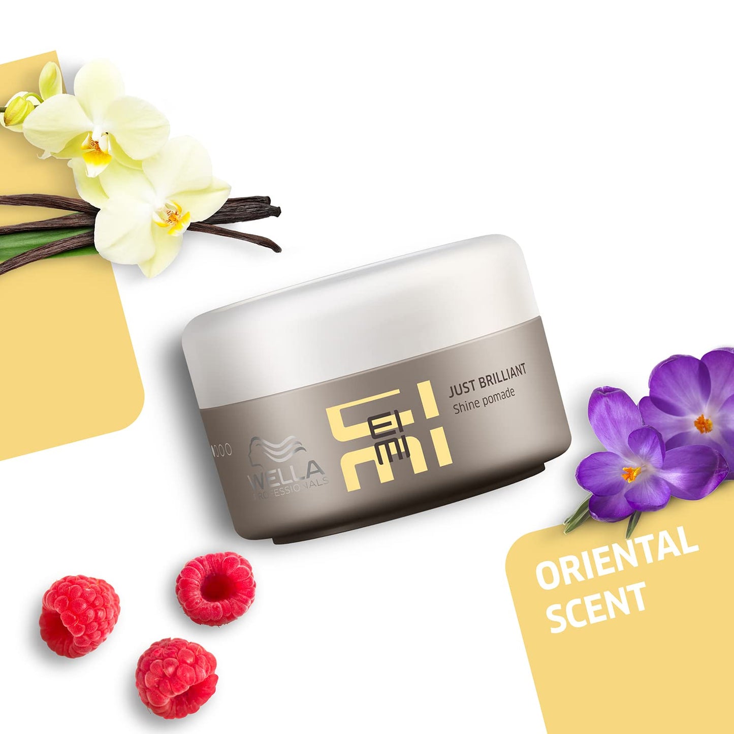Wella Eimi hair product jar with flowers and raspberries on a white background