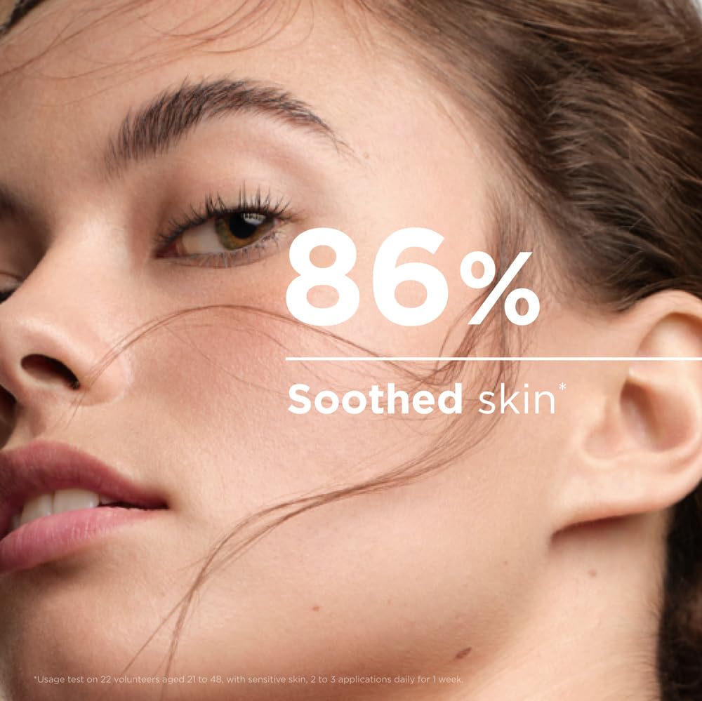 Close-up of a woman's face with text indicating 86% soothed skin.