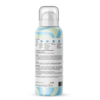 Back view of a spray bottle with a colorful label on a white background