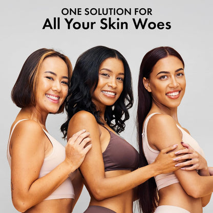 Three women with different skin tones standing together with text 'One Solution for All Your Skin Woes' on a gray background.