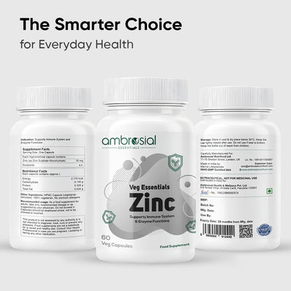 Three bottles of ambrosial Veg Essentials Zinc supplement on a light gray background.