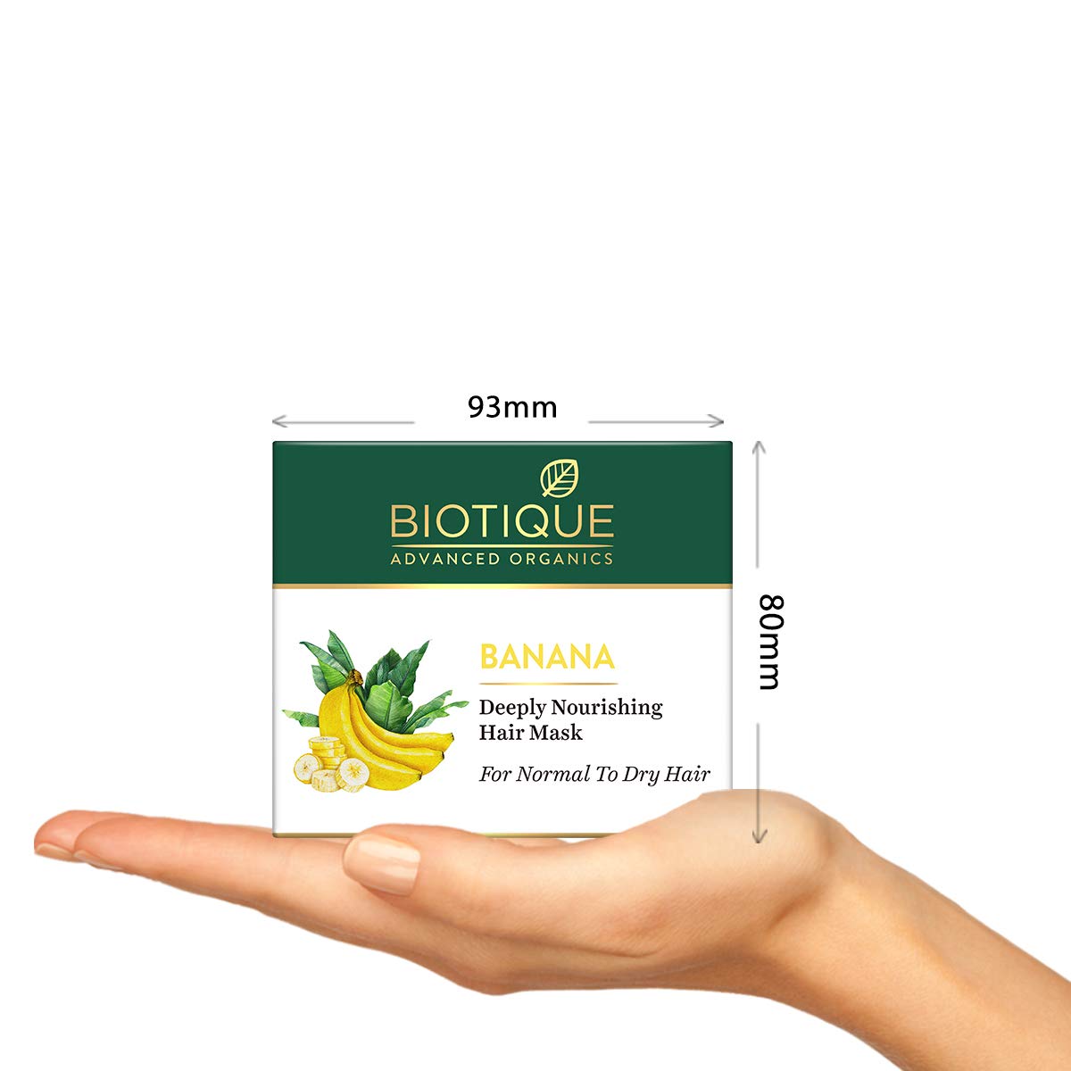 Biotique banana hair mask packaging held in a hand with dimensions indicated.