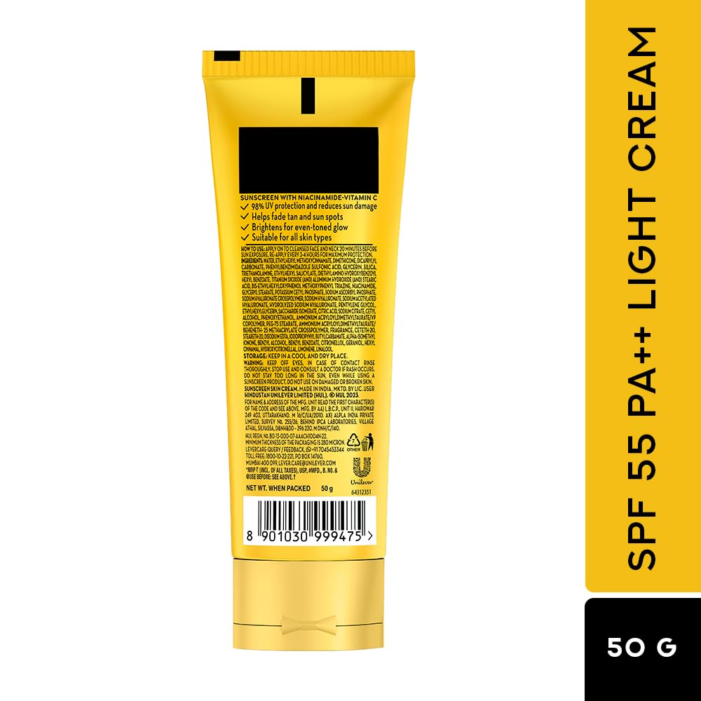 Yellow tube of SPF 55 PA++ light cream on a white background