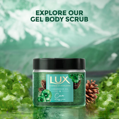 Lux gel body scrub jar with greenery and text on a blurred green background