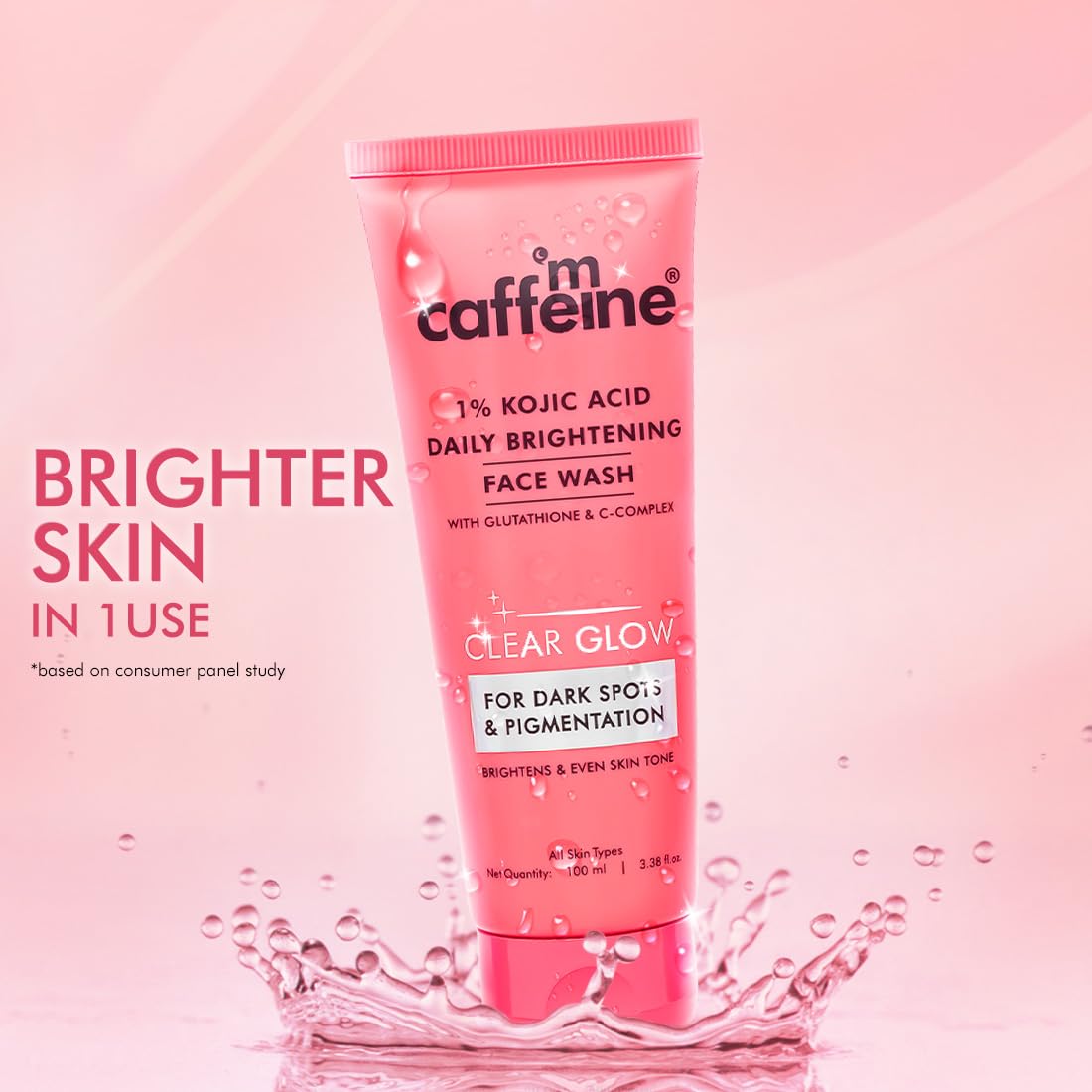 Pink face wash tube with 'caff m caffeine' branding on a pink gradient background