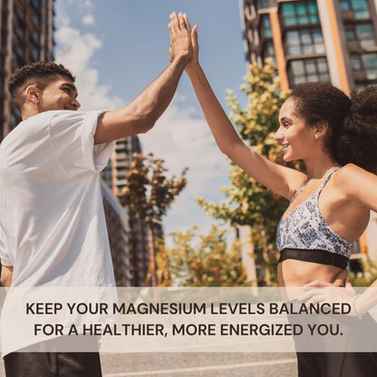 Two people giving each other a high-five outdoors with text about magnesium levels.