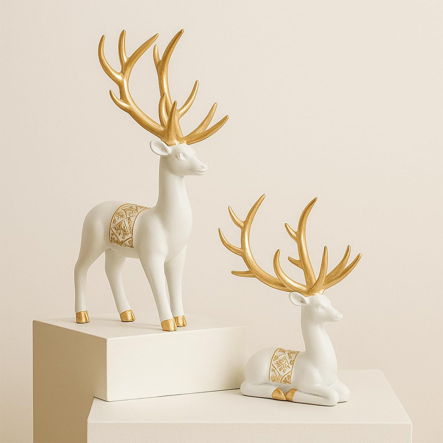 Amazon Basics Charming Polyresin Reindeer Décor | A Timeless Token of Grace & Good Luck | Elevate Your Festive & Everyday Spaces – Pack of 2, White & Golden