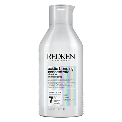 Redken acidic bonding concentrate shampoo bottle on a white background