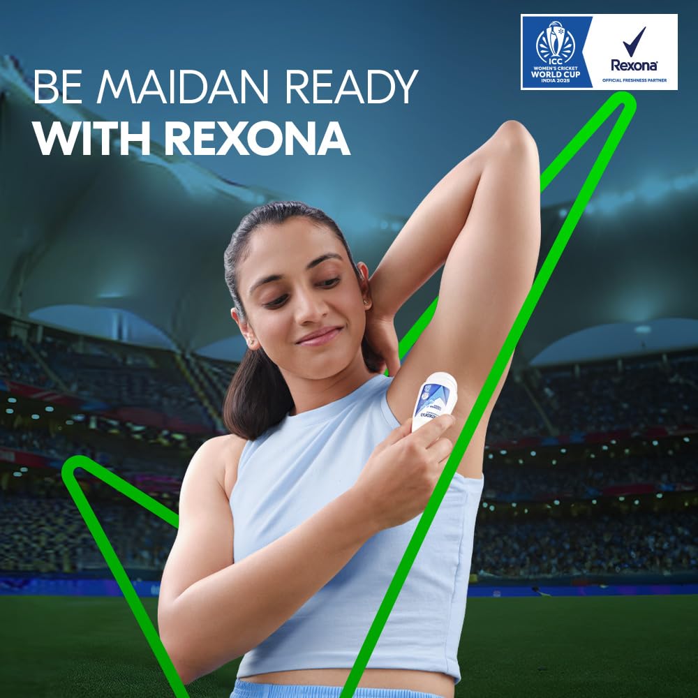 Woman applying deodorant with a stadium background and Rexona branding.