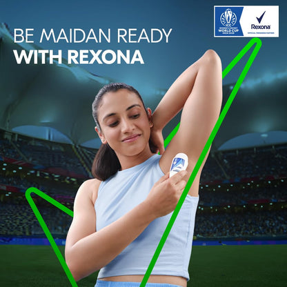 Woman applying deodorant with a stadium background and Rexona branding.