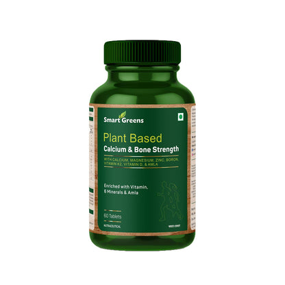Green supplement bottle labeled 'Smart Greens' on a white background