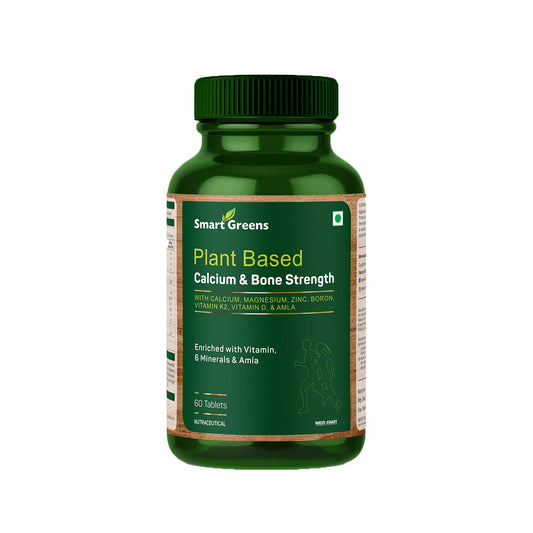 Green supplement bottle labeled 'Smart Greens' on a white background