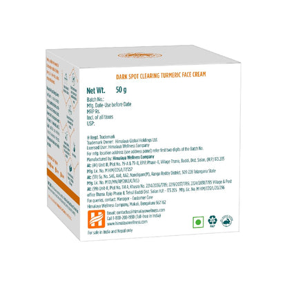 Box of dark spot clearing turmeric face cream with text and branding on a white background