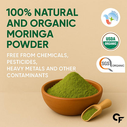 Bowl of green moringa powder with certification logos on a beige background