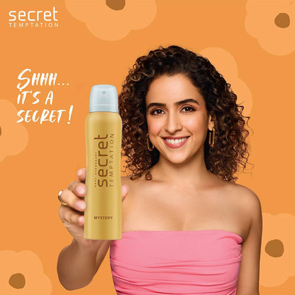Woman holding a 'secret temptation' product with an orange background