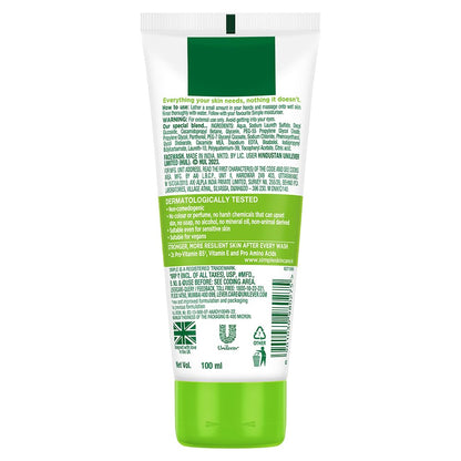 Back view of a green and white skincare product tube with text on a white background
