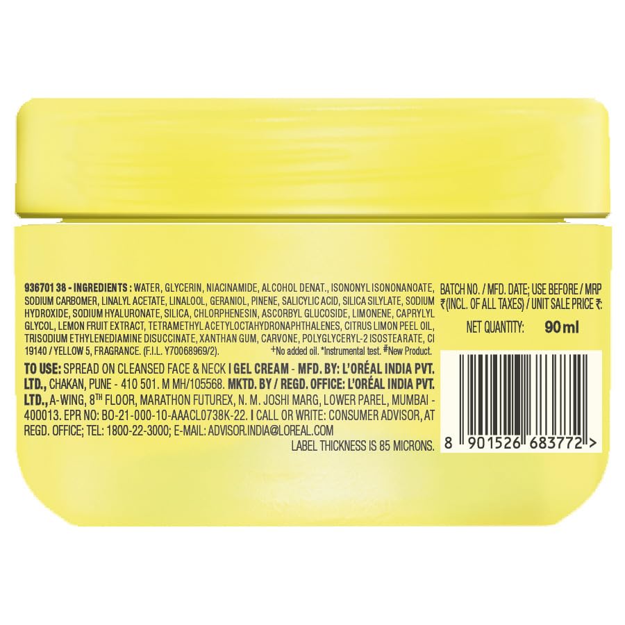 Back view of a yellow container with L'Oreal branding and product details.