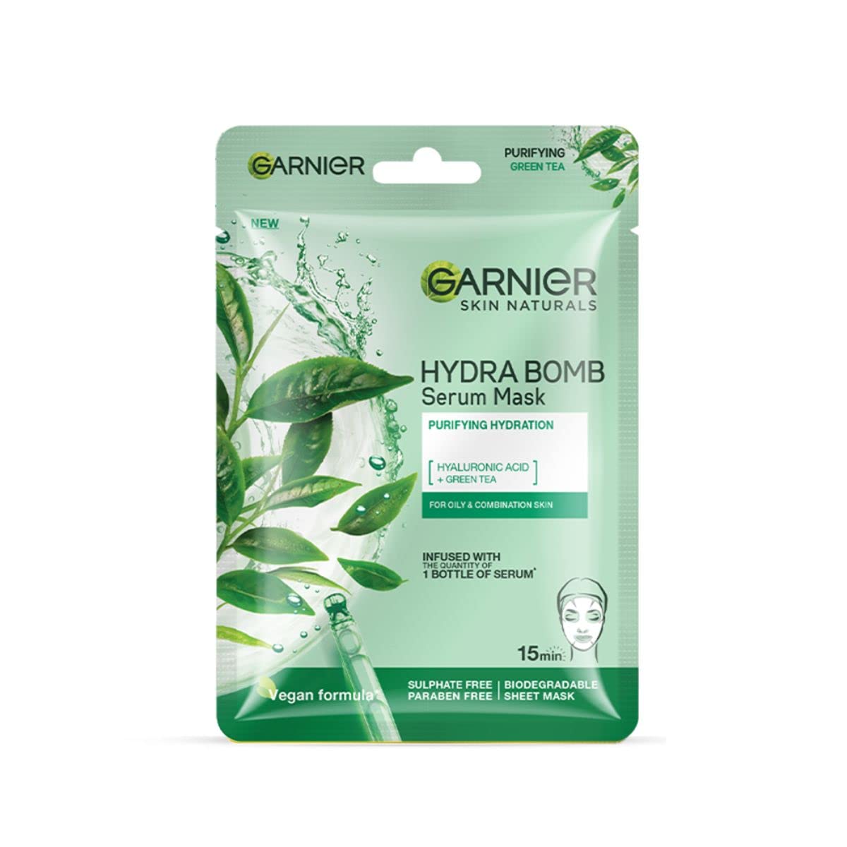 Garnier Hydra Bomb Serum Mask packaging with green tea leaves on a white background