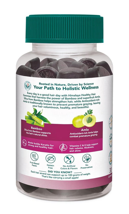 Supplement bottle with a white label featuring text and graphics on a white background