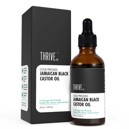 Brown bottle with dropper labeled 'Thrive Jamaican Black Castor Oil' next to a black box with the same branding.