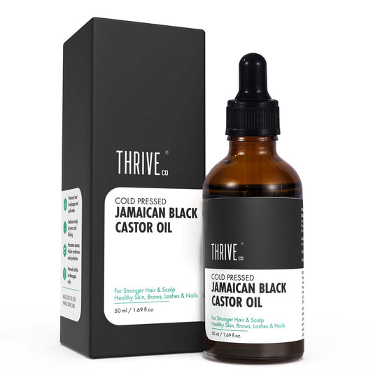 Brown bottle with dropper labeled 'Thrive Jamaican Black Castor Oil' next to a black box with the same branding.