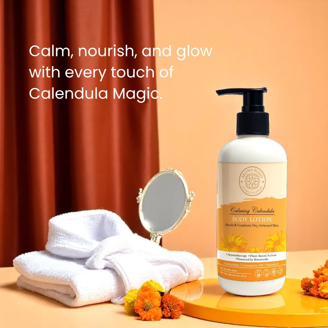 Hand cream bottle with towels and flowers on a wooden surface against an orange curtain.