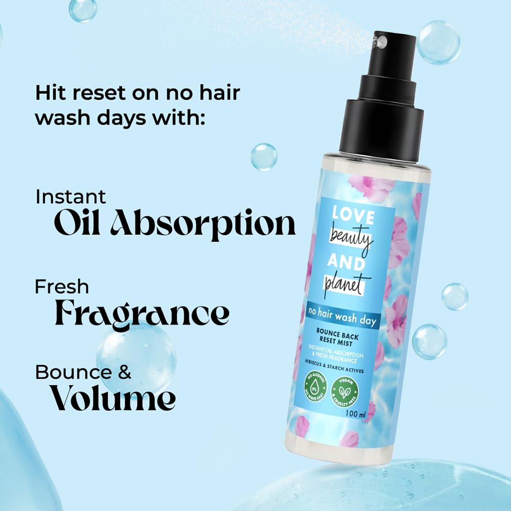 Bottle of 'Love Beauty and Planet' no hair wash day product with text on a light blue background
