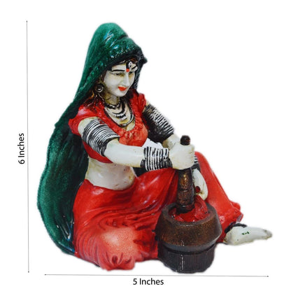 Rajasthani Lady Grinding Chilli Showpiece Polyresin Statue (12.5 cm x 10 cm x 15 cm, Green and Orange)