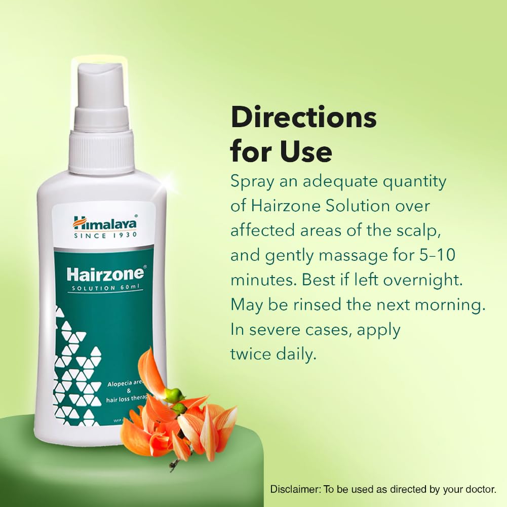 Himalaya Hairzone Solution bottle with usage directions on a green background