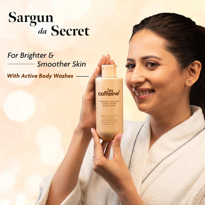 Woman holding a bottle of 'm caffeine' body wash with a blurred background