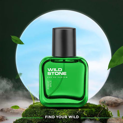Green perfume bottle with 'Wild Stone' branding on a natural background