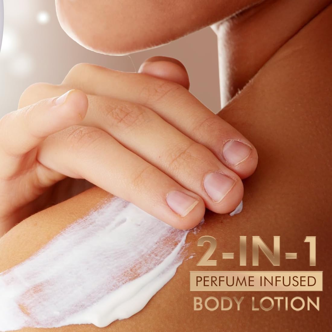 Hand applying 2-in-1 perfume infused body lotion to skin