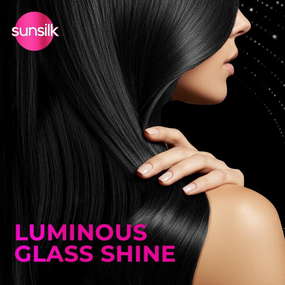 Sunsilk hair care product advertisement with a woman holding her long, shiny black hair against a dark background.