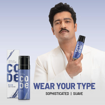 Man holding Wild Stone Code perfume with packaging on a light blue background