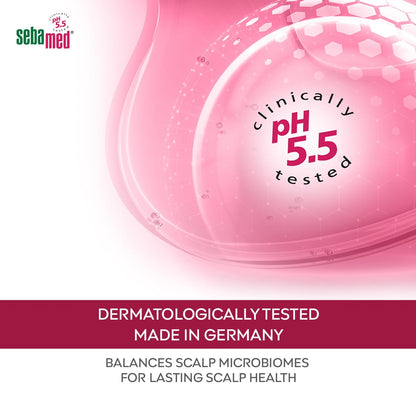 Pink scalp care product with 'Sebamed' branding and pH 5.5 information on a white background.