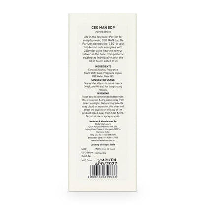 Back label of a perfume bottle with text and branding on a white background