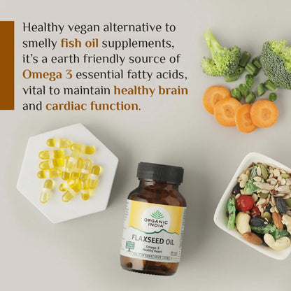 Flaxseed oil bottle with capsules and vegetables on a light background