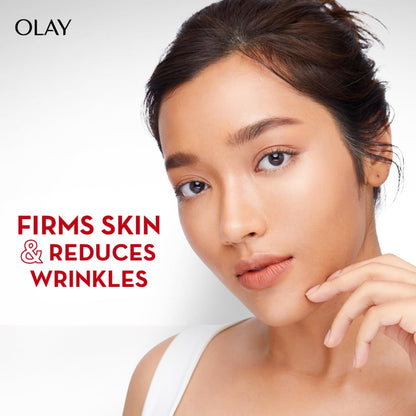 Advertisement for Olay skin care product with a model showing firm skin and reduced wrinkles.