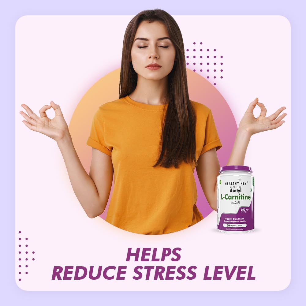 Woman in orange shirt meditating with a bottle of Healthy Net Aetyl L-Carnitine on a colorful background