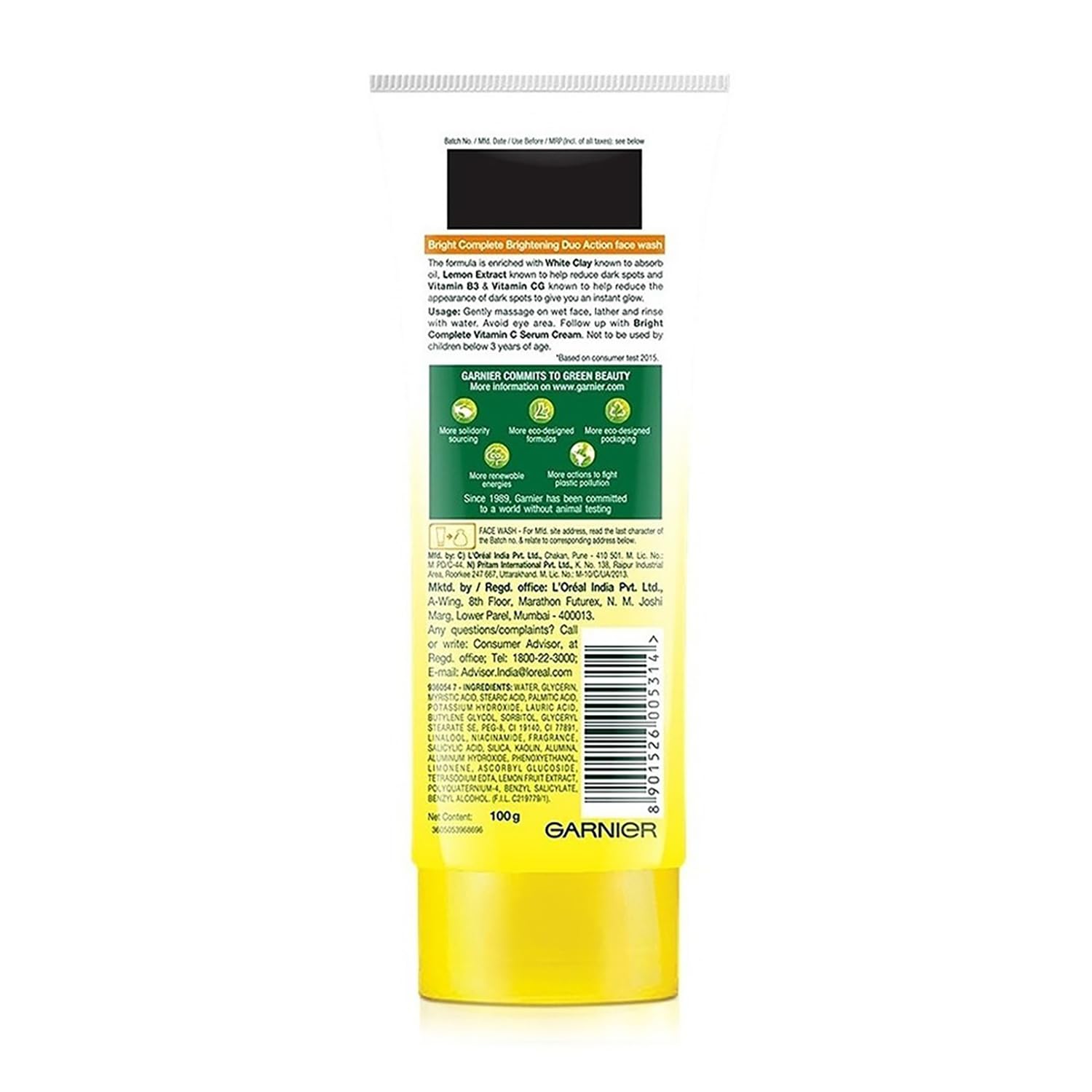 Back view of a yellow skincare product container with text and branding on a white background